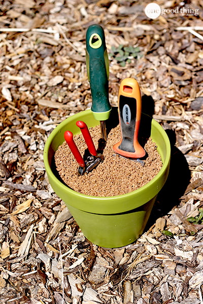 A pot of sand used to sharpen Gardening Tools